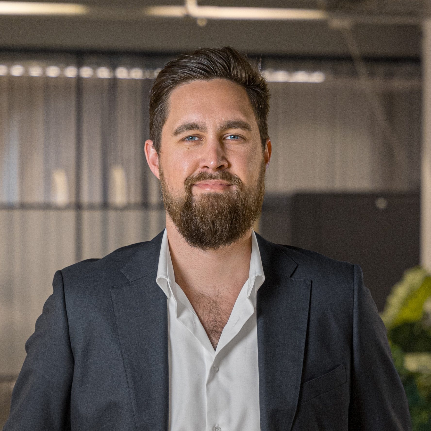 Mitchell Fitzsimmons 1 - Profile Picture Professional front on, close up image of Senior Associate and commercial property specialist Mitchell Fitzsimmons smiling.